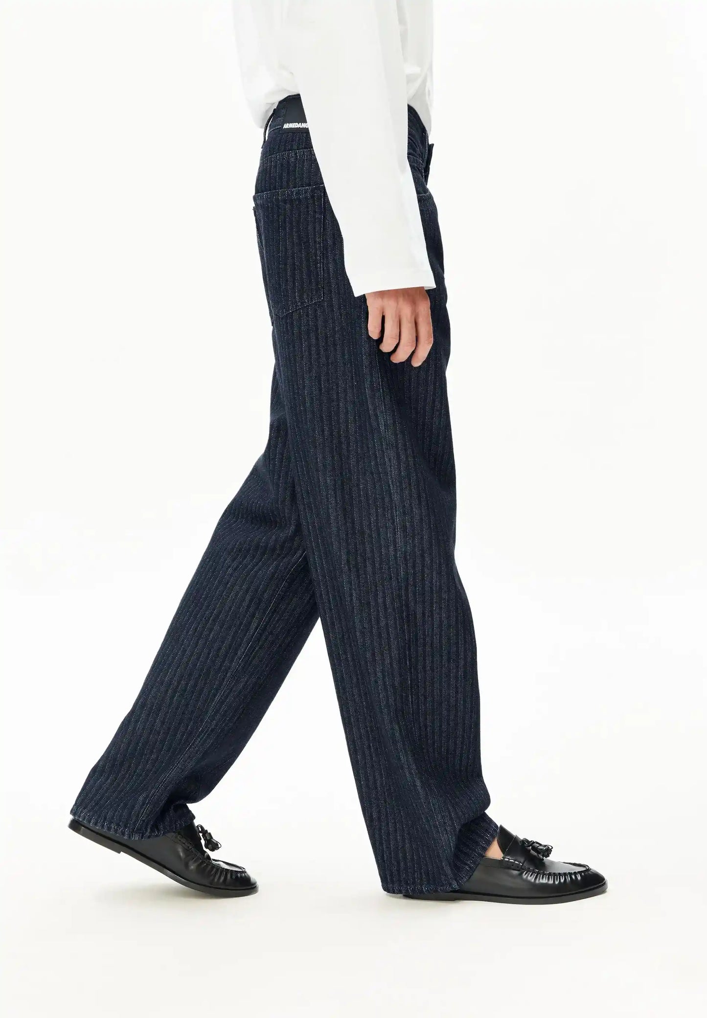 ARMEDANGELS Canada – HAAYI Herringbone Baggy Jean in Rinse side view on model in Kelowna