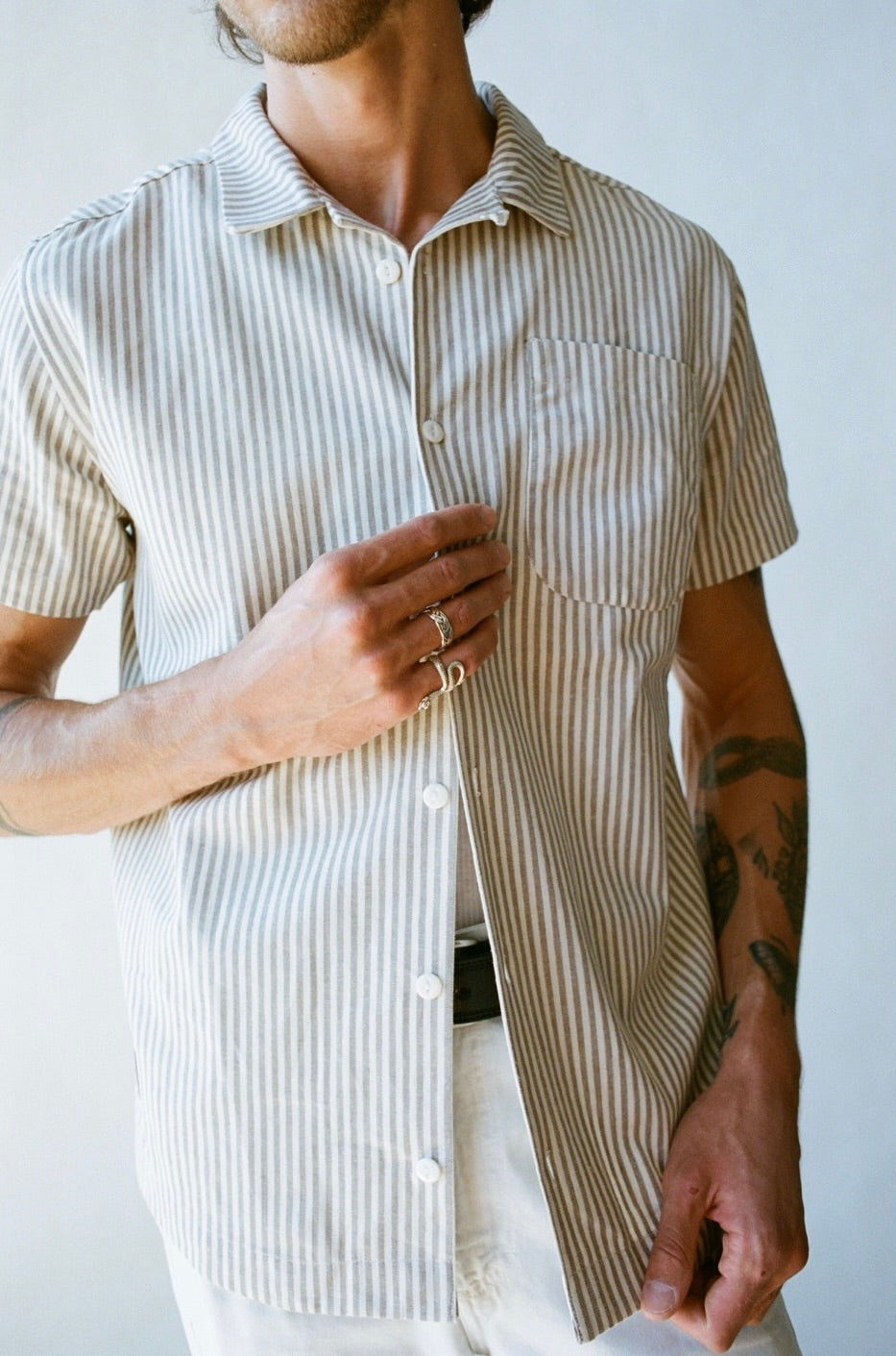 SS24 - Saturday Project - The Leisure Shirt in Natural Stipe - close-up button -up 3