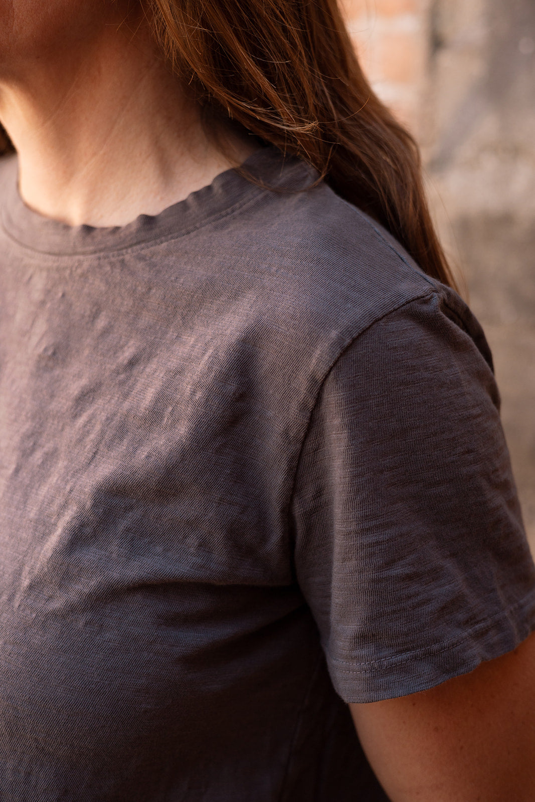 SS24 - It is Well L.A - Crop Tee in Charcoal - on model close-up side 2