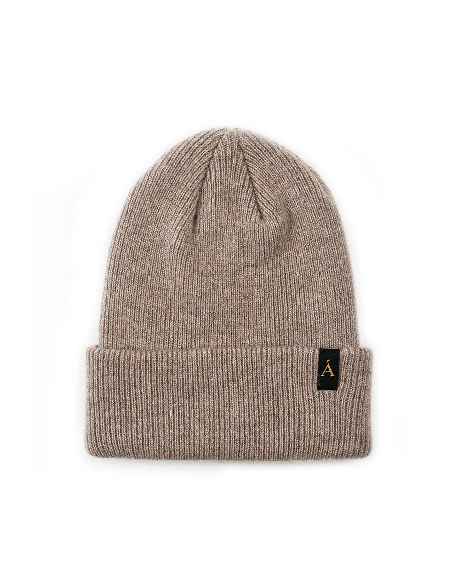 Anian taupe rib knit toque with folded cuff and black logo tag soft warm winter accessory in Kelowna