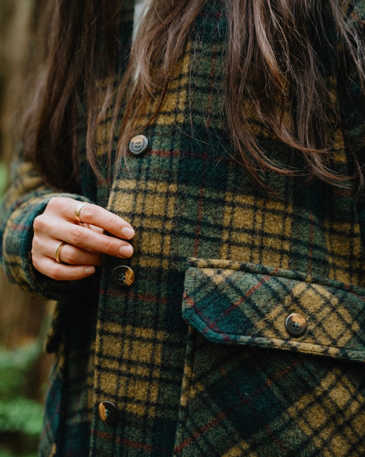 Anian Georgia coat plaid in green and brown, featuring a classic check pattern and front buttons in Kelowna