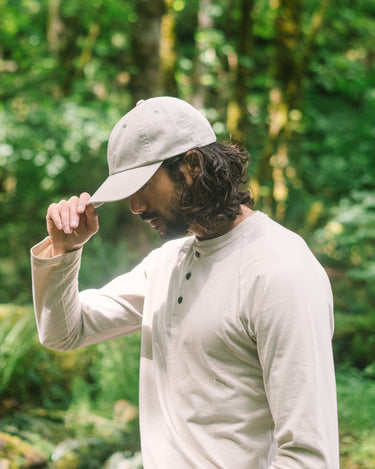 Anian beige cotton hat worn by man, casual adjustable cap with curved brim in Kelowna