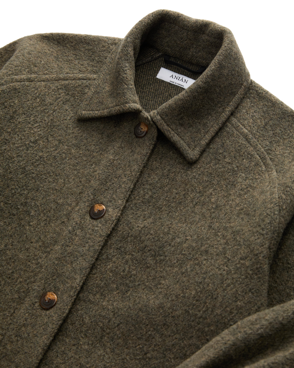 Anian olive wool button front loft coat with classic collar and textured warm fabric in Kelowna