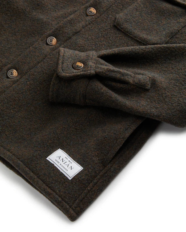 Anian mens wool coat in dark brown with button front chest pocket cuff detail and sewn label hem in Kelowna
