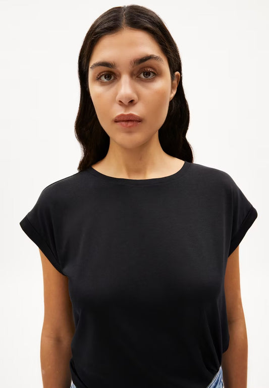 ARMEDANGELS Canada black short sleeve t-shirt with relaxed fit on female model in Kelowna