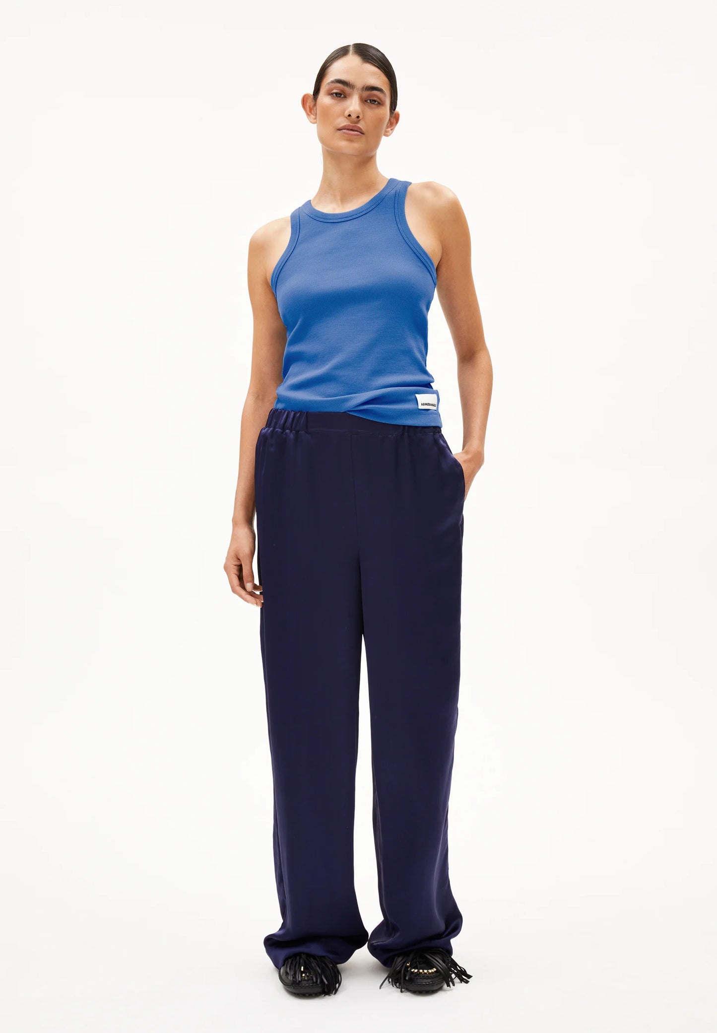 ARMEDANGELS Canada Women's Blue Ribbed Tank Top paired with Navy Wide-Leg Pants for a Casual Look in Canada
