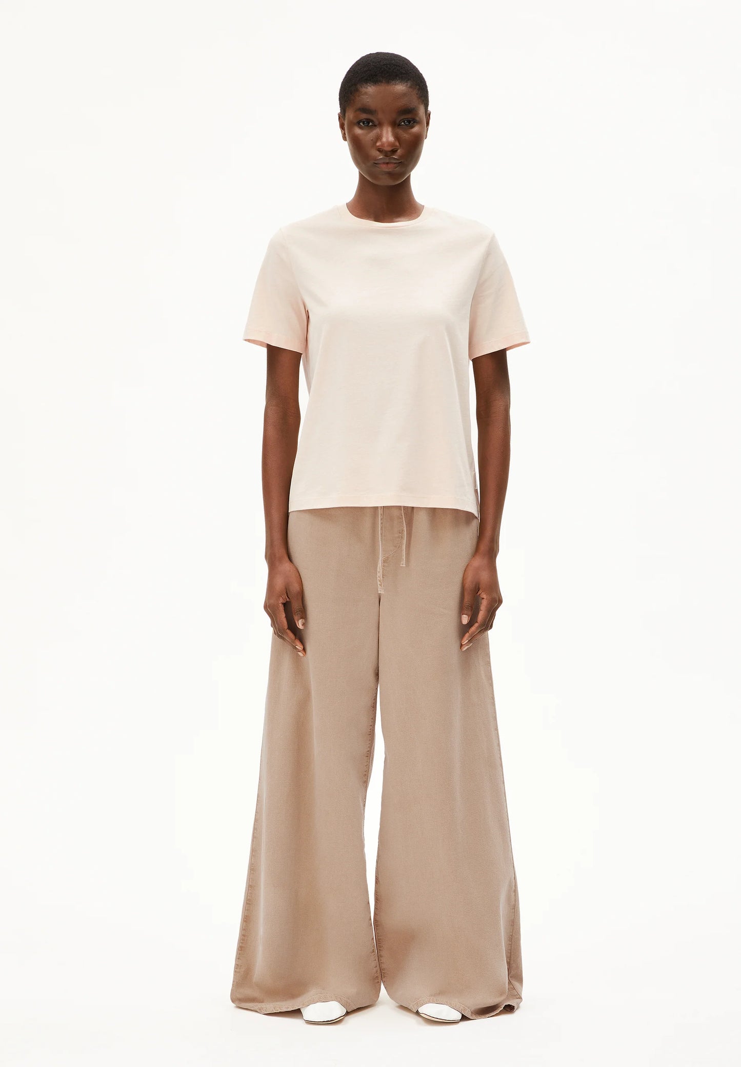 ARMEDANGELS Canada Women's T-Shirt in Light Beige, paired with Flowing Beige Pants for a Stylish Look in Canada