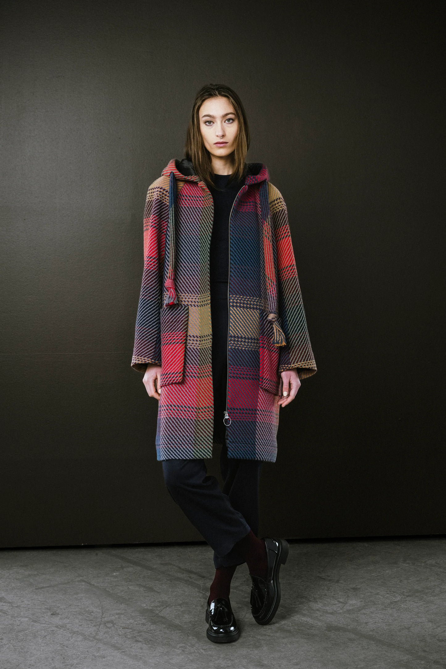 BodyBag by Jude plaid coat featuring a stylish hood and vibrant multi-colour pattern in Kelowna