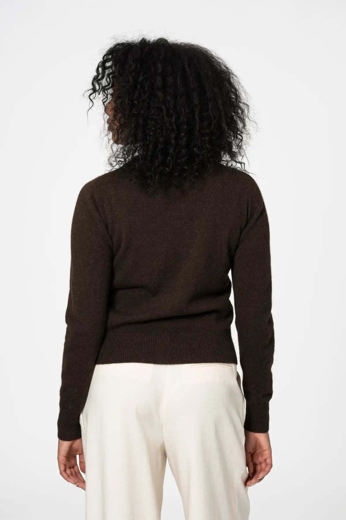 Back view of a dark brown cardigan by Dinadi, perfect for casual layering and comfort in Kelowna and Canada