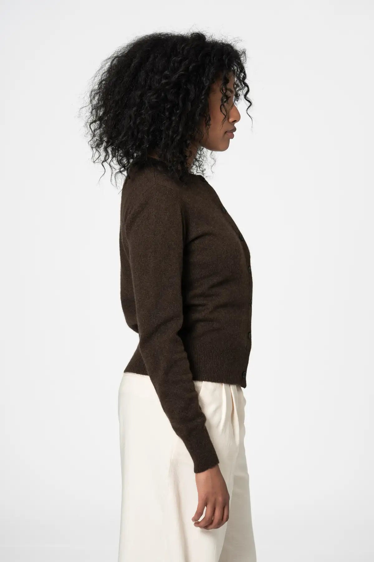 Dinadi dark brown cardigan shown from the side, showcasing a fitted style and soft fabric in Kelowna and Canada