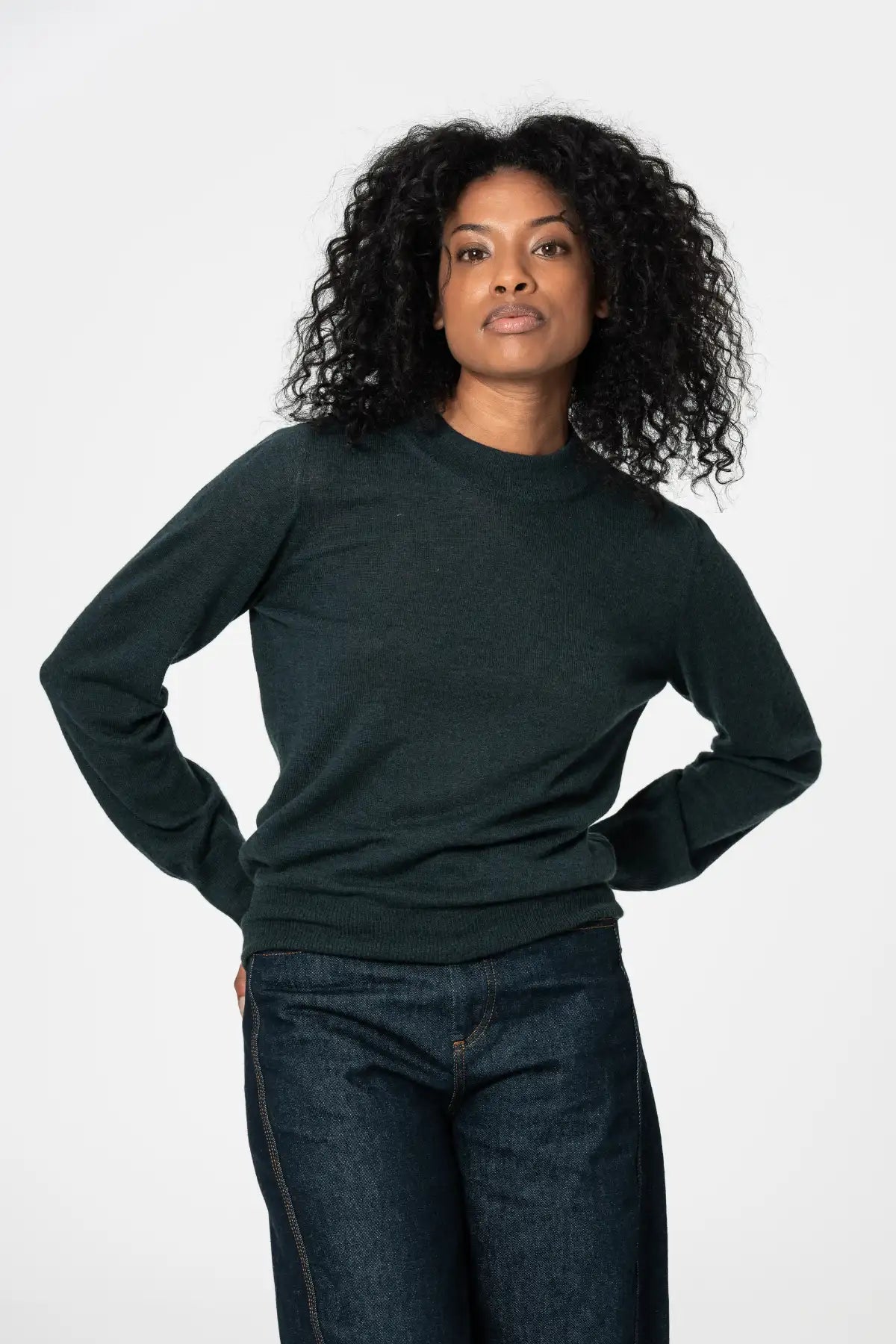 Dinadi womens merino wool sweater in dark green with a classic fit and long sleeves in Kelowna and Canada