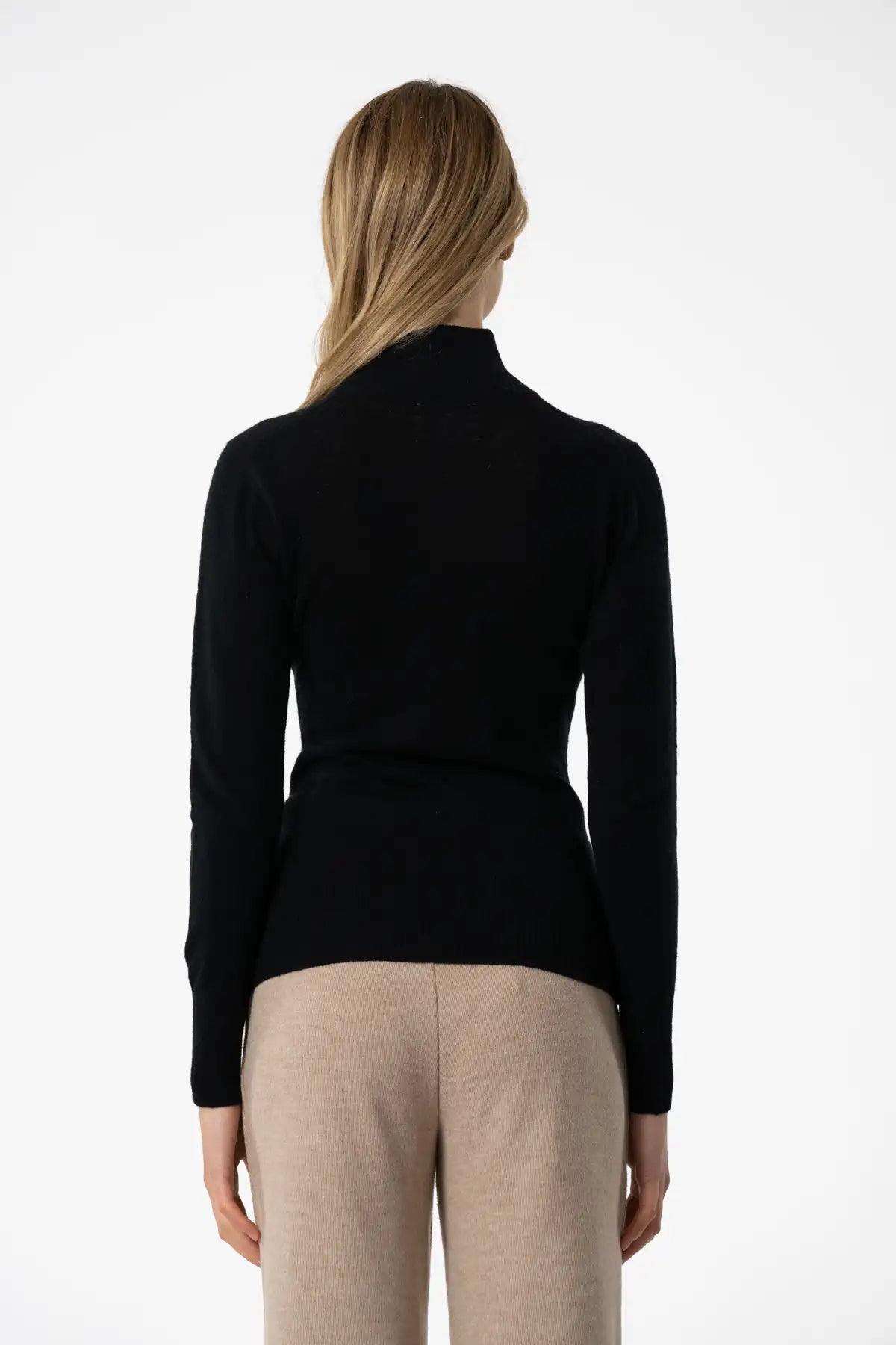 Dinadi women's merino wool turtleneck sweater in black, featuring a sleek back design in Kelowna and Canada