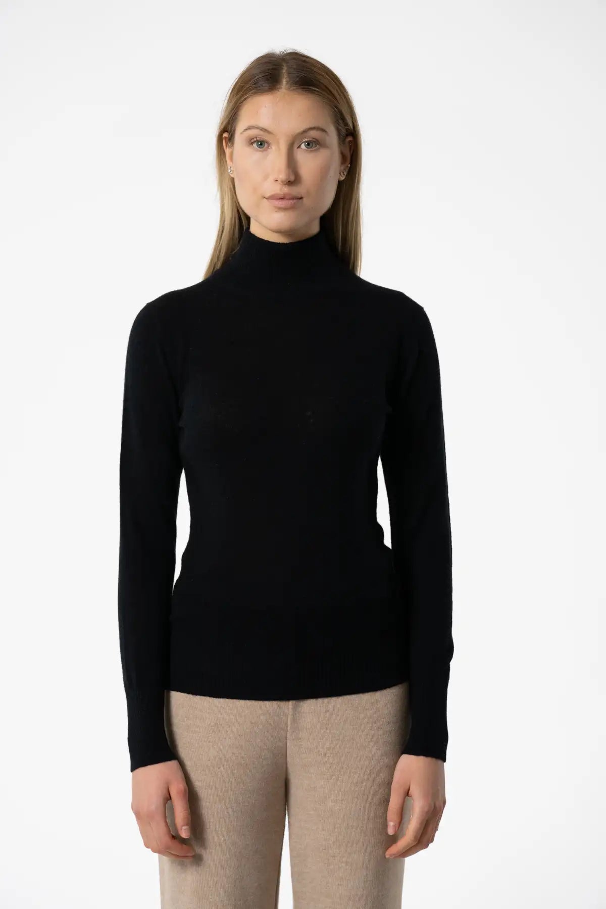 Dinadi women's merino wool turtleneck in black, a stylish and warm addition for any outfit in Kelowna and Canada