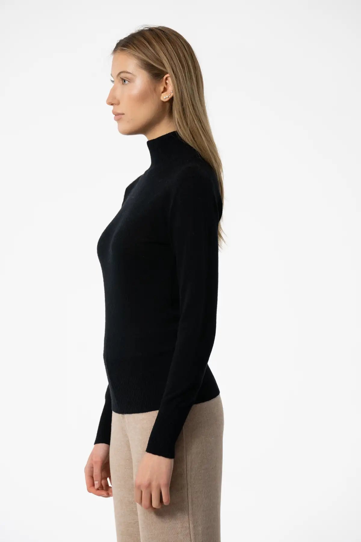 Elegant women's merino wool turtleneck in black, perfect for layering and stylish looks in Kelowna and Canada