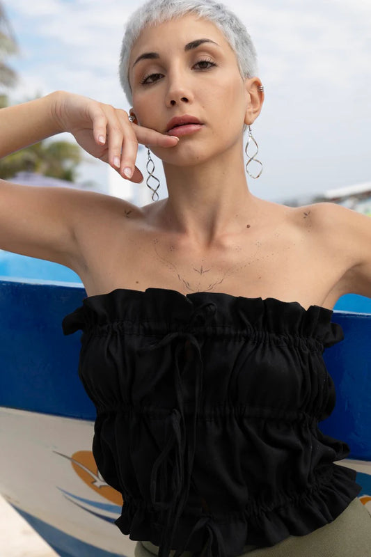 Black MAS Montréal sleeveless top with ruffled neckline and cinched waist for a chic summer look in Kelowna