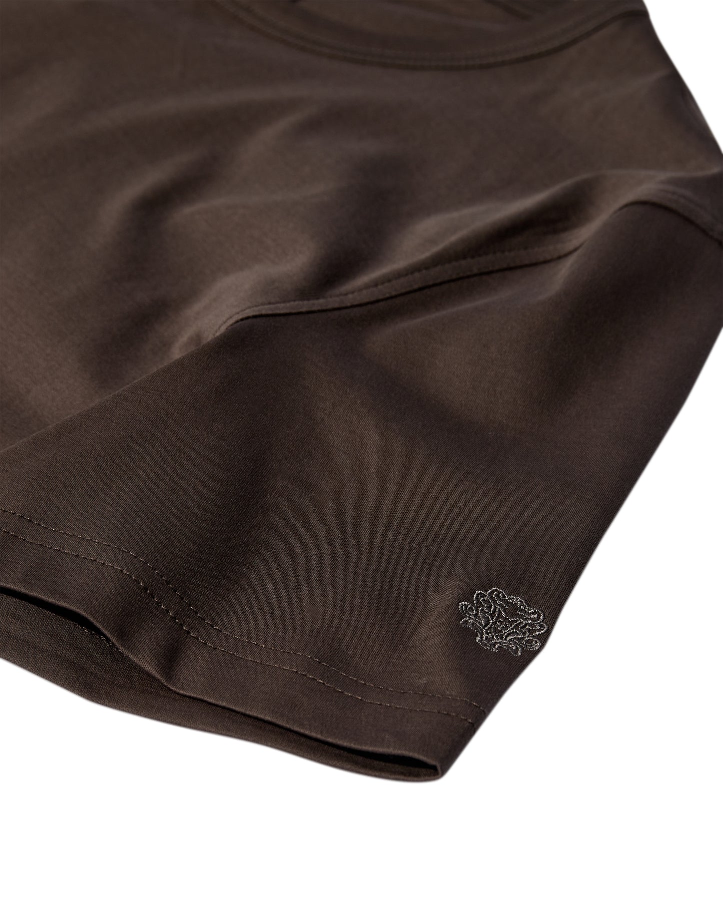Mos Mosh Gallery organic chocolate brown t-shirt close up of smooth fabric hem and small embroidered logo in Kelowna