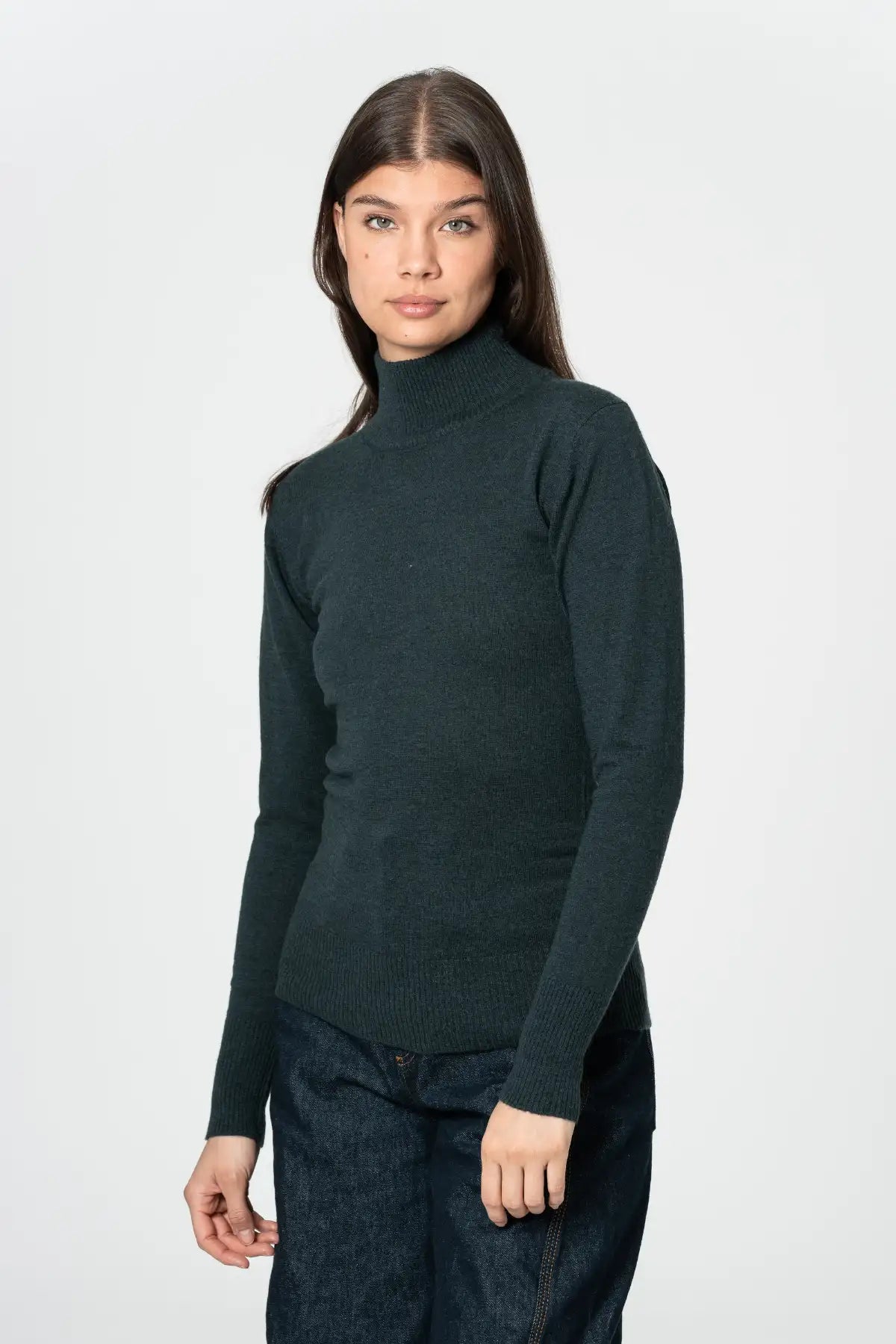 Dinadi women's merino turtleneck in dark green, perfect for cozy fall layering