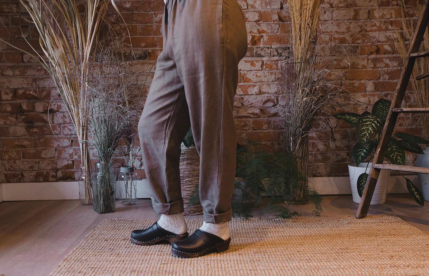 Classic Black Clogs on Brown Base