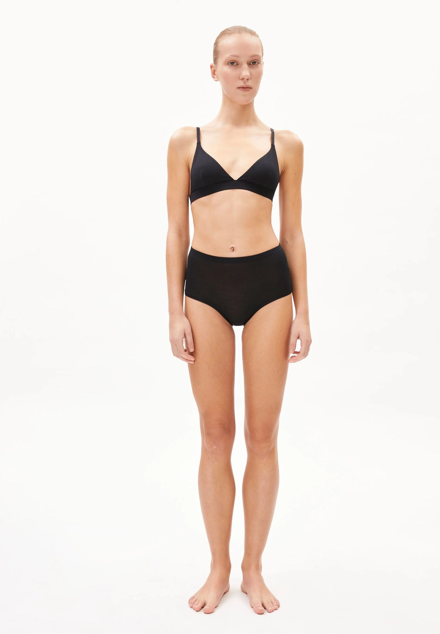 BIRTAA High Waist Underwear - ARMEDANGELS Canada front view on model of panties and bra in black