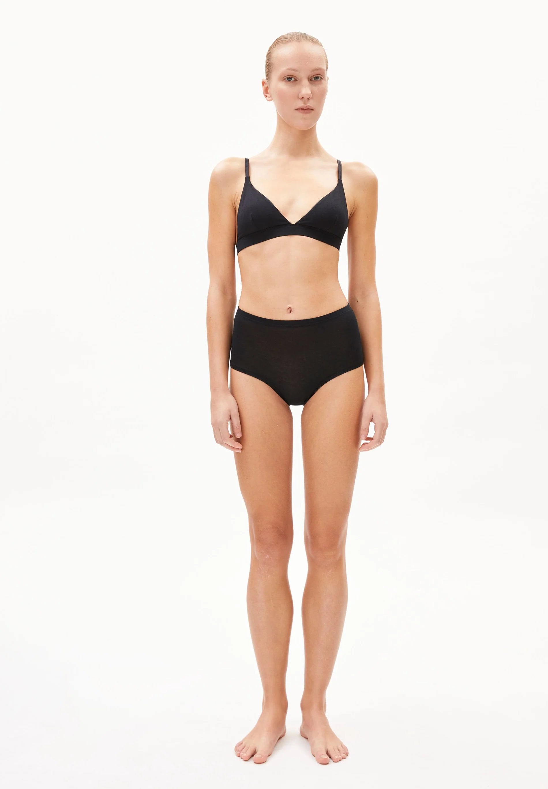 BIRTAA High Waist Underwear - ARMEDANGELS Canada front view on model of panties and bra in black