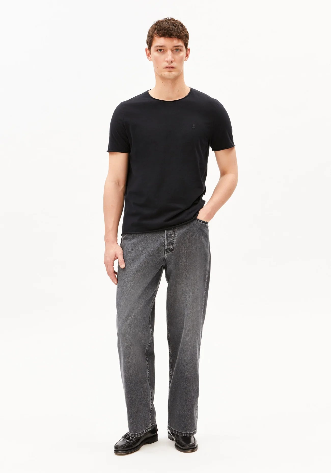 Men's black t-shirt organic cotton JAAMES BRUSHED T-SHIRT in Black - ARMEDANGELS Canada front view on model in Kelowna