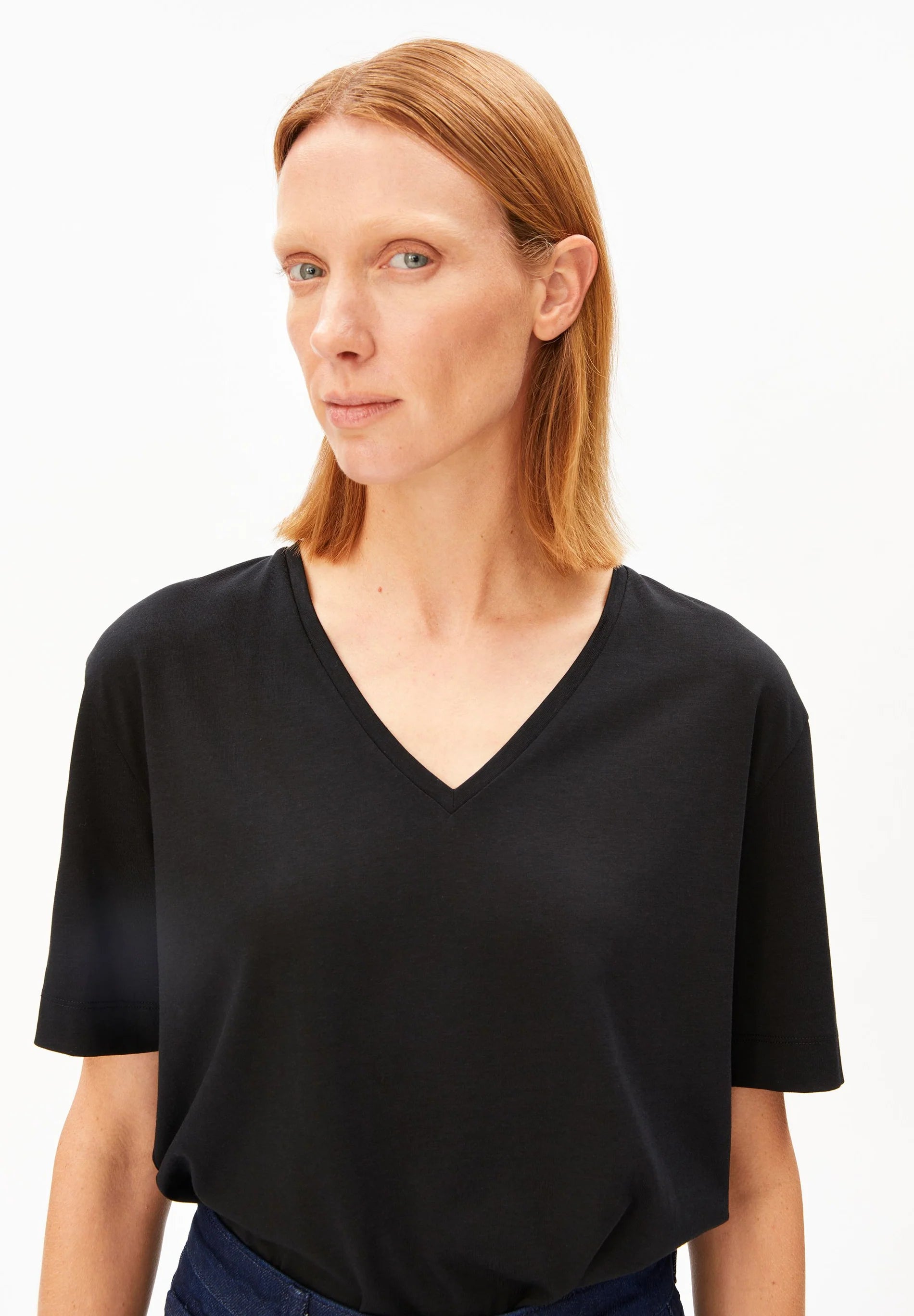 Close up of front view - black V-Neck T-Shirt – ARMEDANGELS Canada in Kelowna