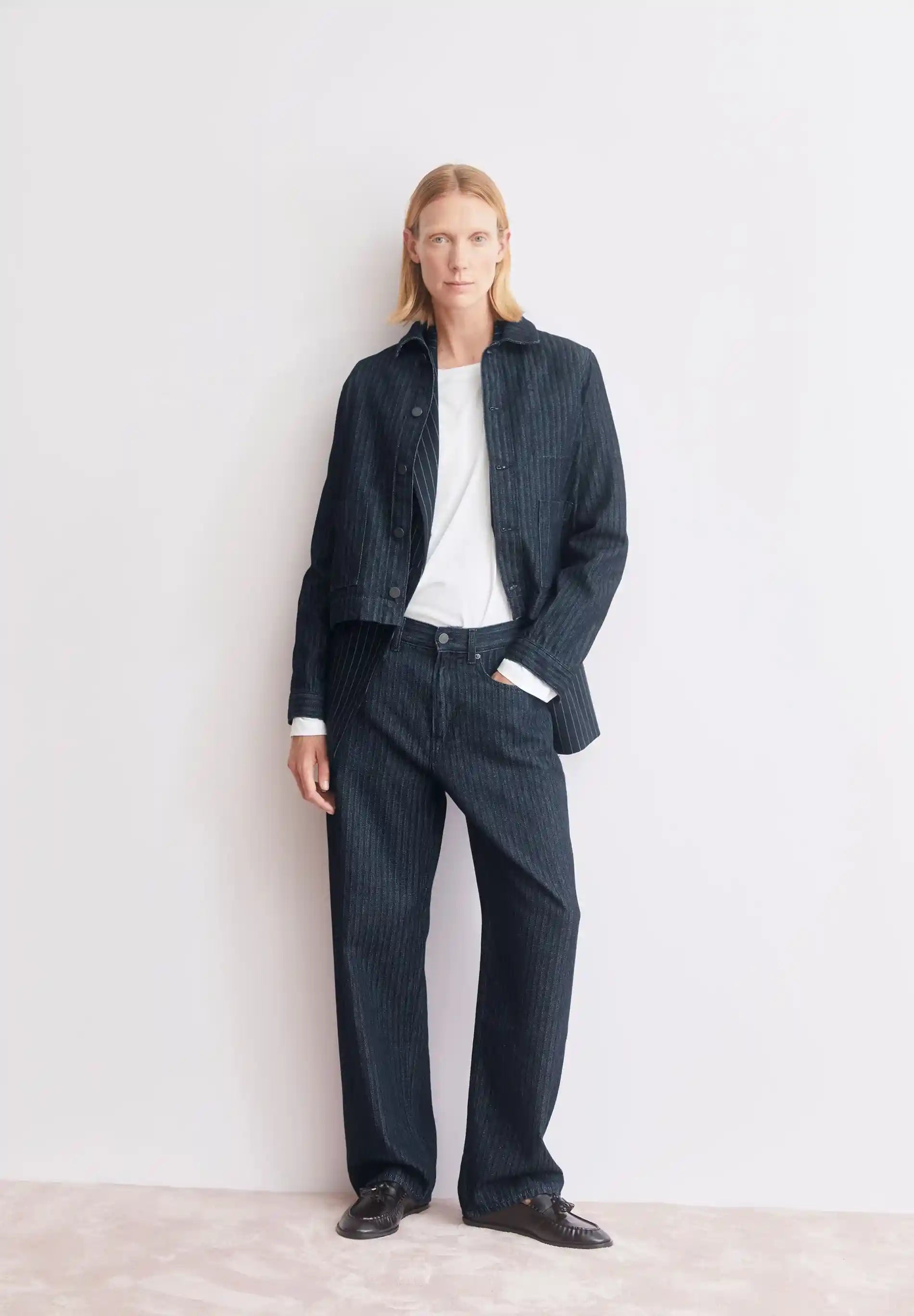 ARMEDANGELS Canada – HAAYI Herringbone Baggy Jean in Rinse paired with matching jacket on model in Kelowna