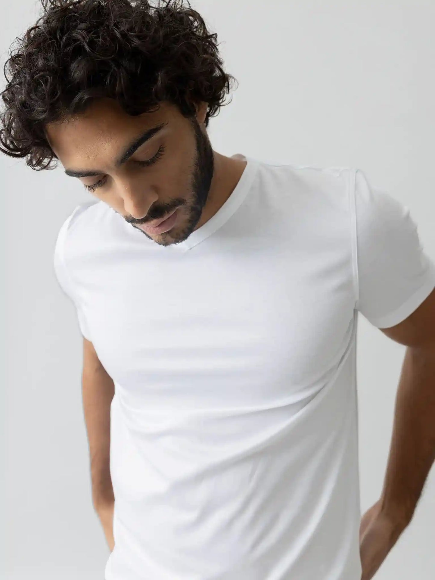 Mos Mosh Gallery V-neck tee in white on model front view at Textile Apparel Kelowna
