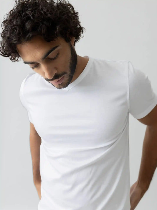 Mos Mosh Gallery V-neck tee in white on model front view at Textile Apparel Kelowna