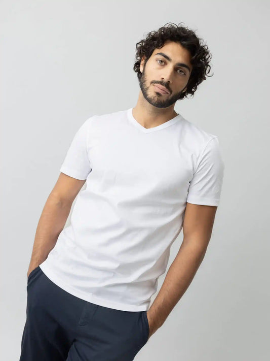 Mos Mosh Gallery cotton V-neck tee in white on model front view at Textile Apparel Kelowna