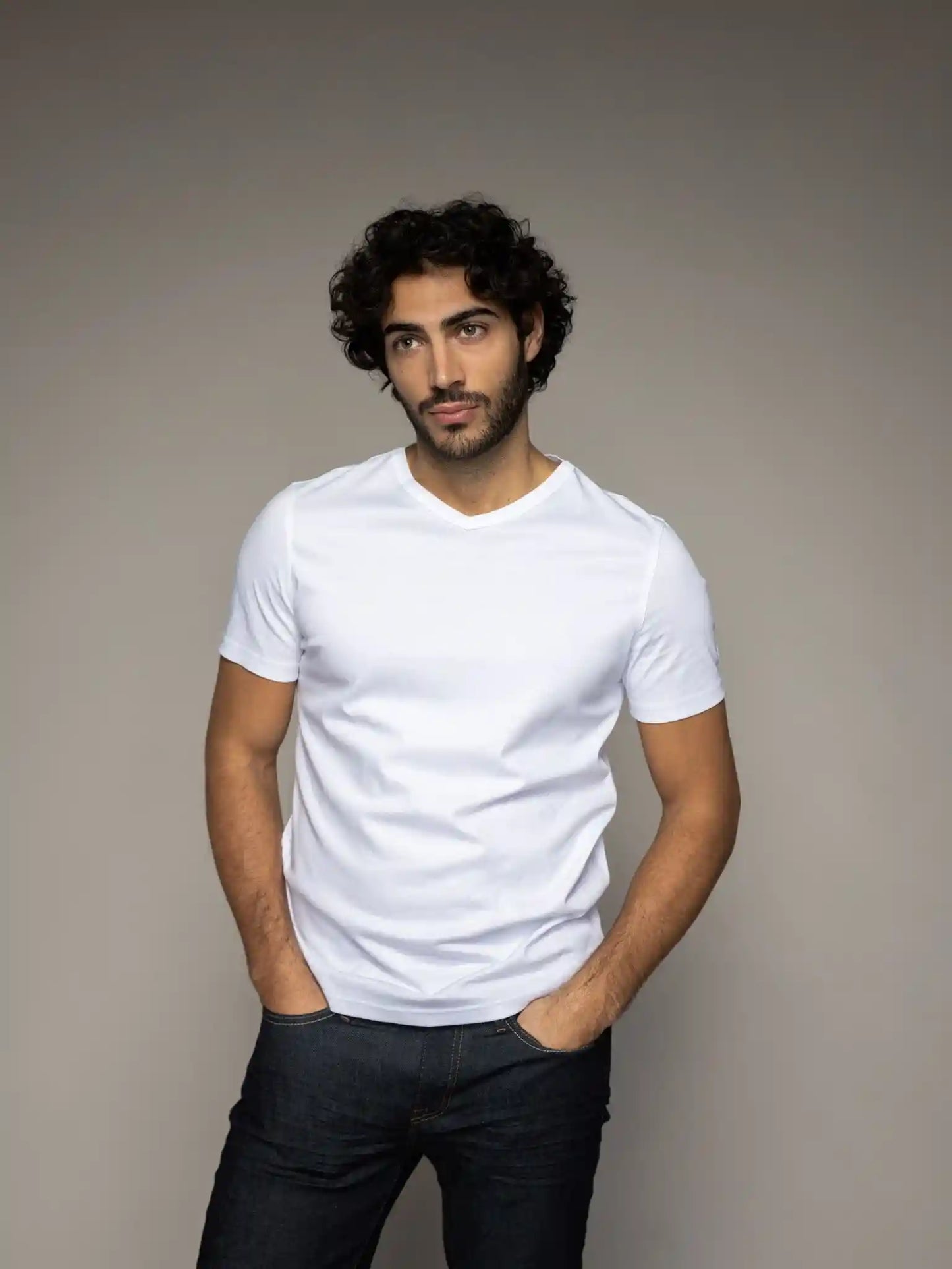 Mos Mosh Gallery V-neck tee in white on model front view at Textile Apparel Kelownam ade from organic cotton