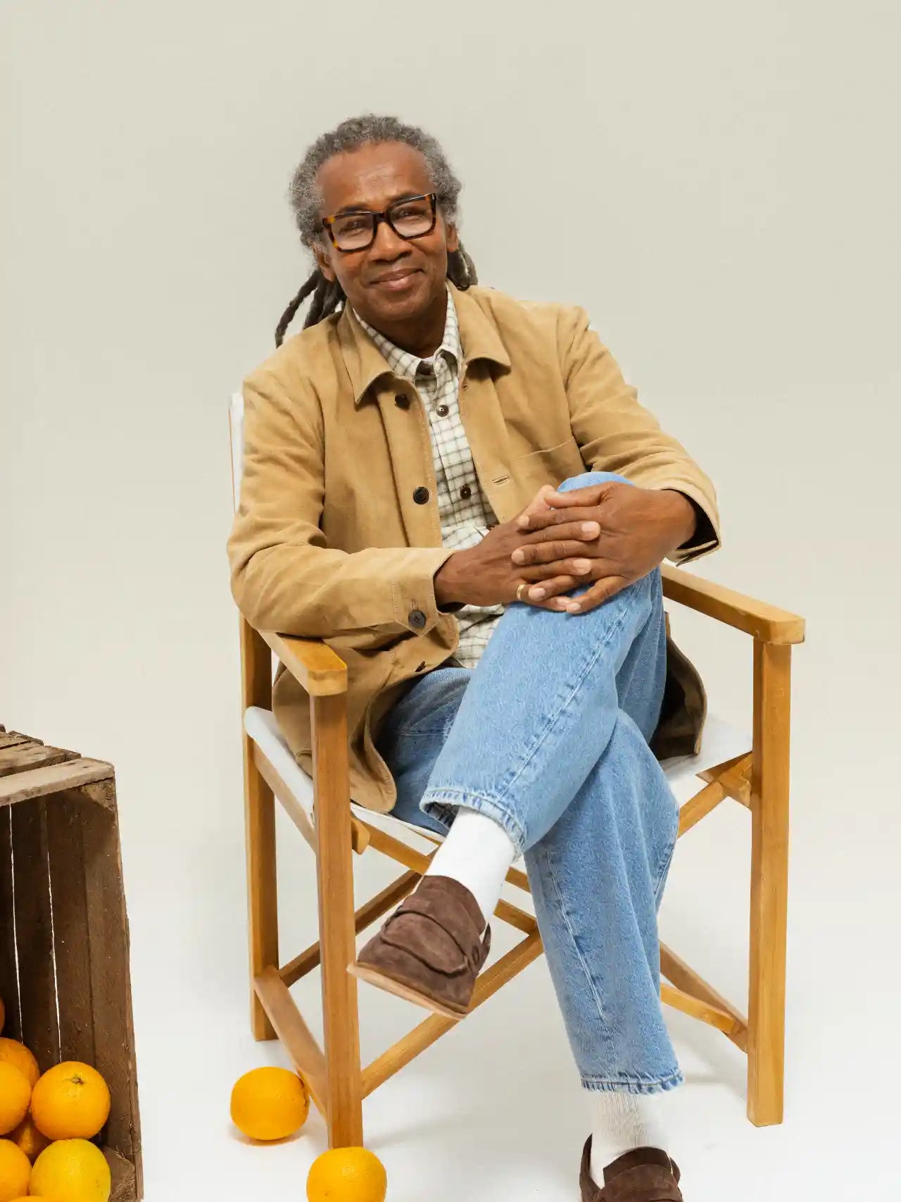 MOS MOSH Gallery Conor Toasted Coconut Suede Jacket – shop men's jackets in Canada model in studio sitting in chair