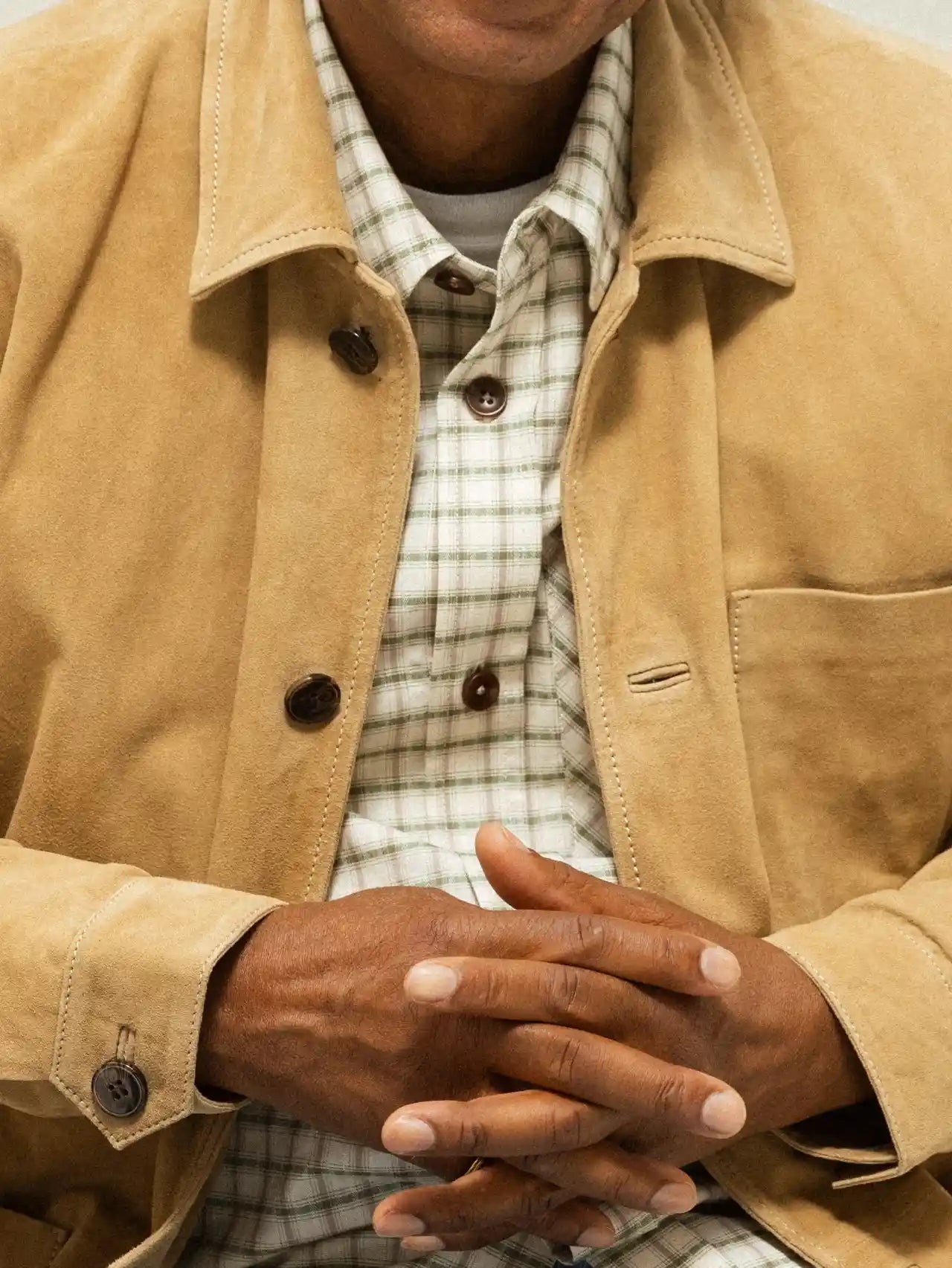 MOS MOSH Gallery Conor Toasted Coconut Suede Jacket – shop men's jackets in Canada close up on model with hands clasped together