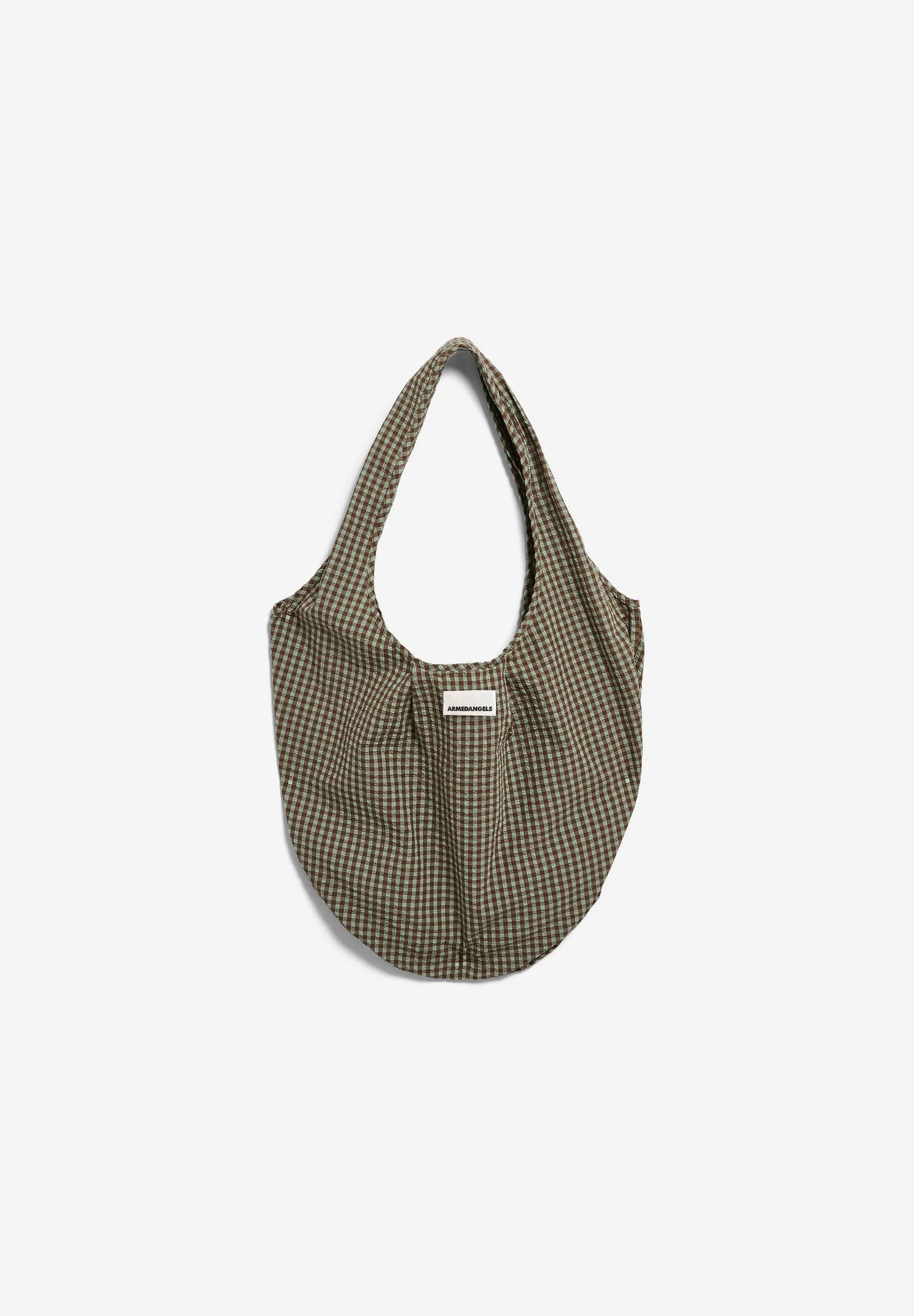 flat lay of brown and green checkered vichy seersucker pouch bag