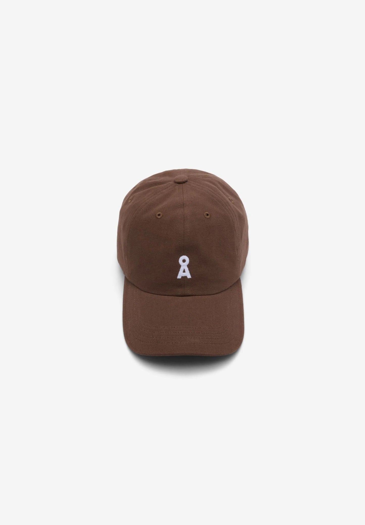 Brown cap with a small white logo on a white background
