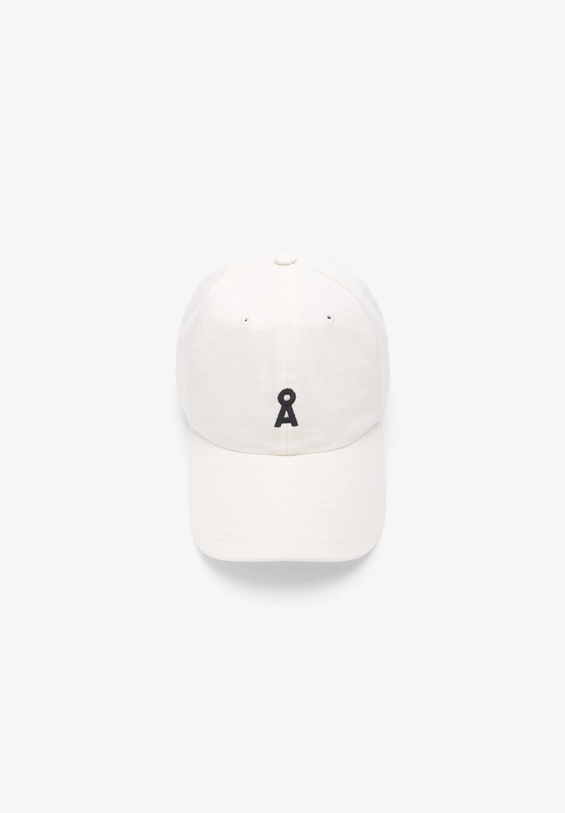 White cap with a black logo on a white background