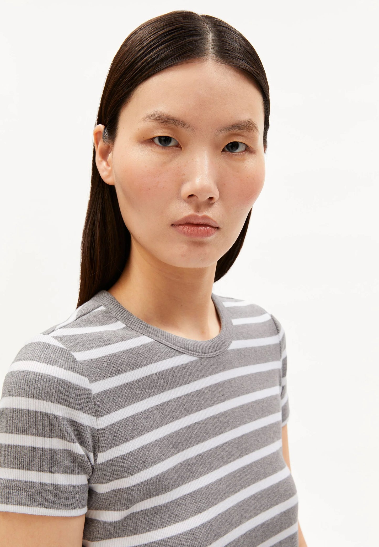 close up on model of women's ARMEDANGELS KARDAA Ribbed Stripes T-Shirt, organic cotton
