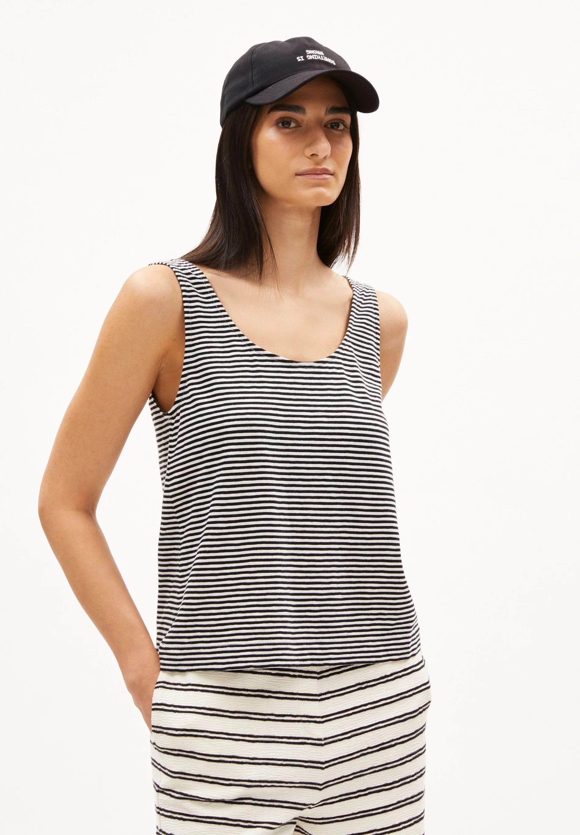 ARMEDANGELS MINAAMI LITA TOP in Black-Oatmilk, front view on model, organic cotton stripe tank top
