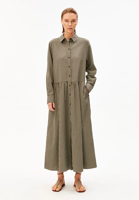 Full length model shot in green and brown check dress for Kelowna and Canada