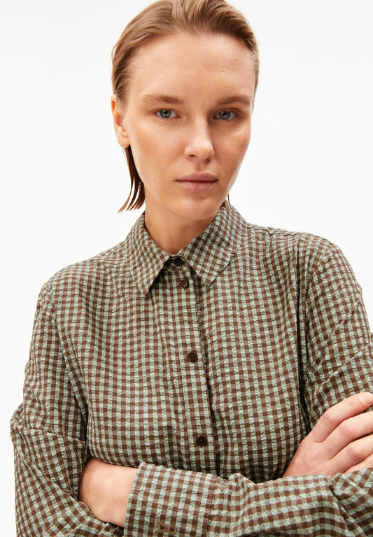cropped model shot in green and brown check dress for Kelowna and Canada