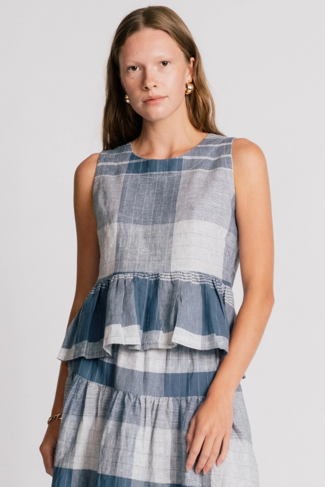blue plaid linen cotton blend blouse from Alison Wonderland. Front view close up on model in Kelowna.