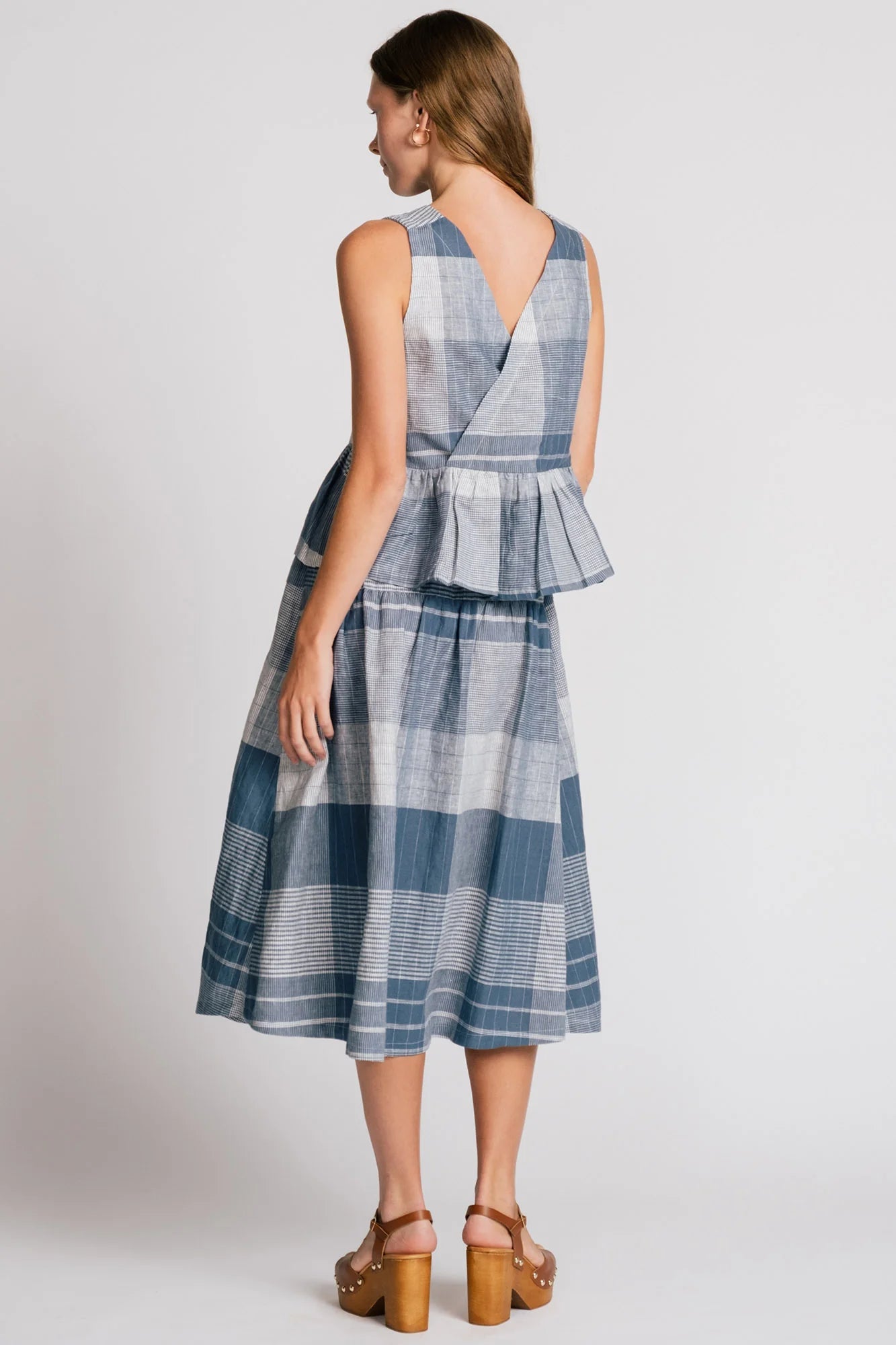 blue plaid linen cotton blend blouse from Alison Wonderland. Back view on model in Kelowna.