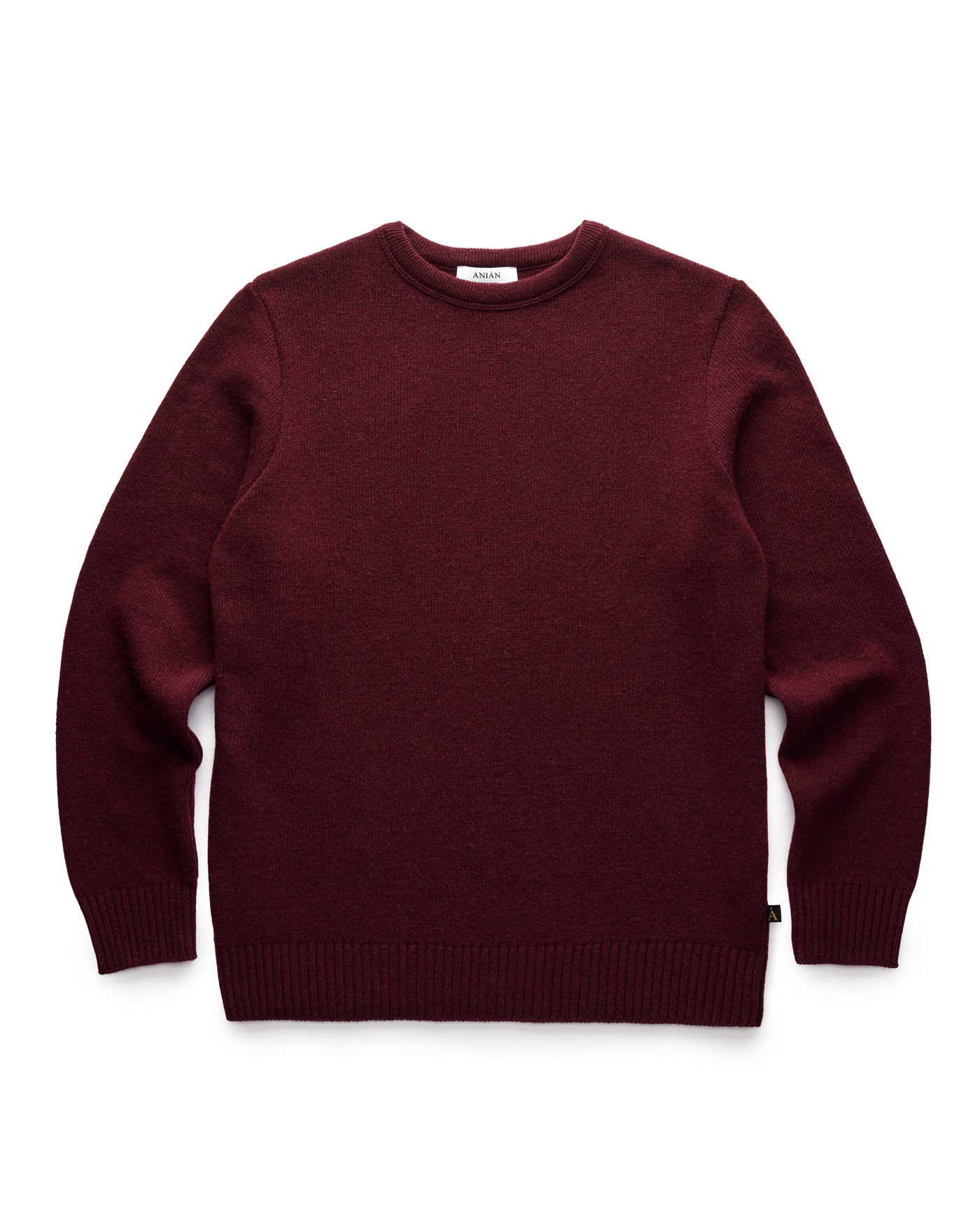 Maroon sweater on a white background