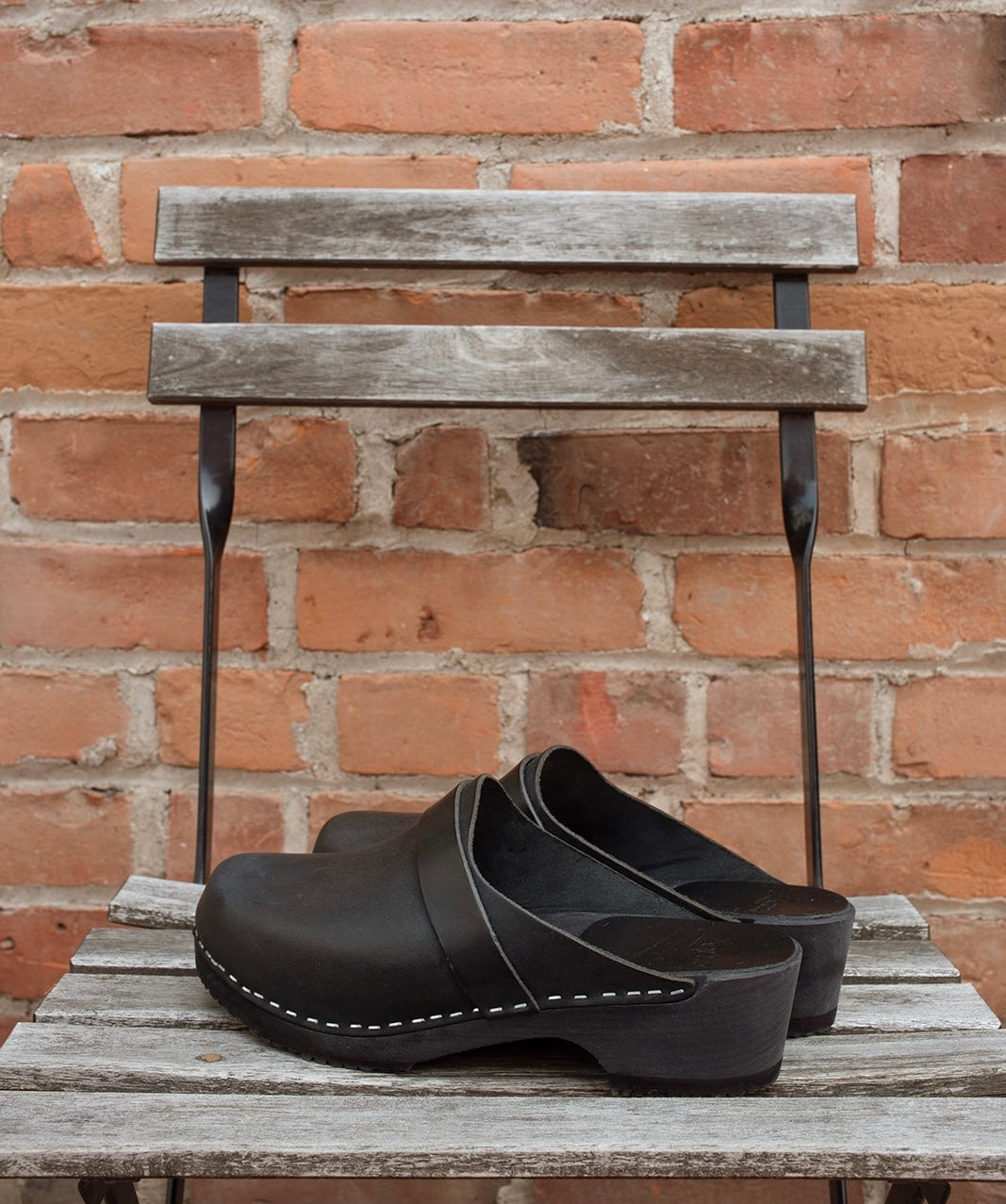 Elsa Classic Black Leather Clogs on Black Base