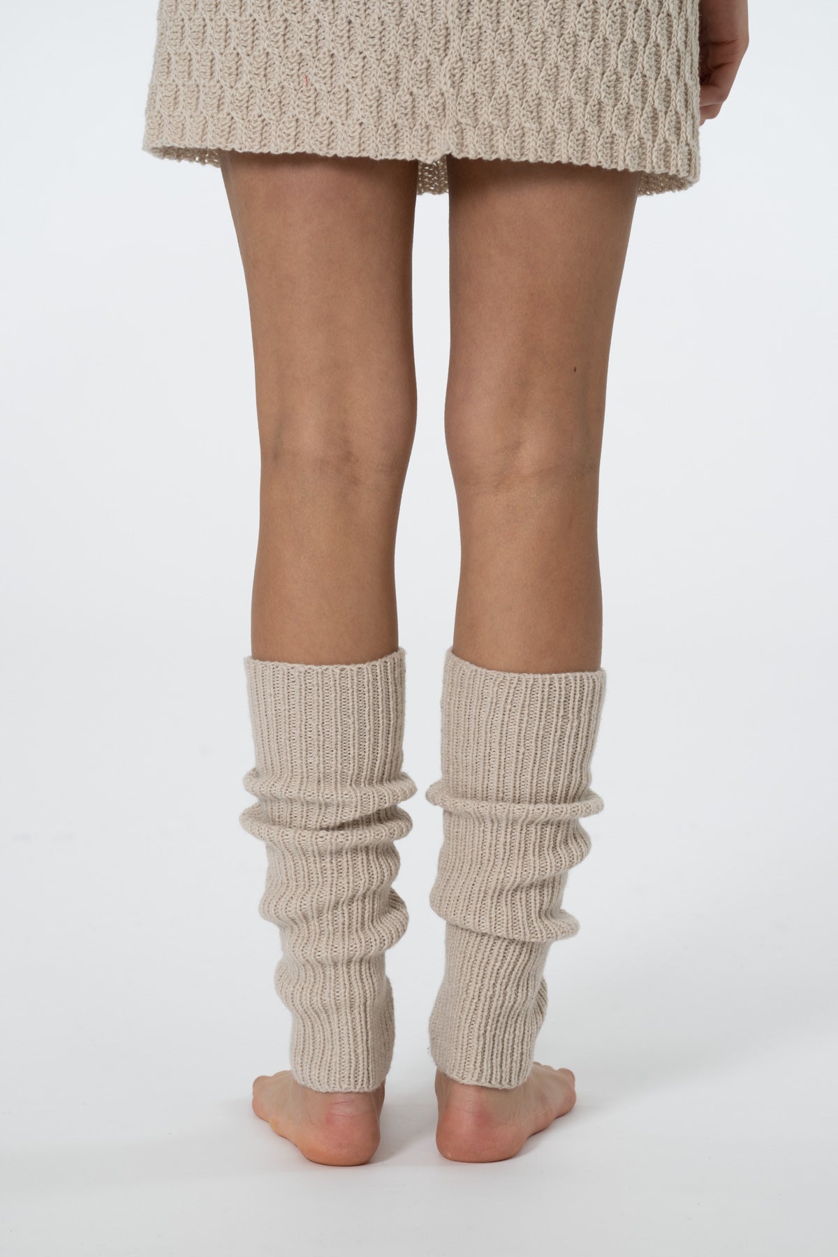 Dinadi Merino Handknit leg warmers in Almond white Fall 23/24 