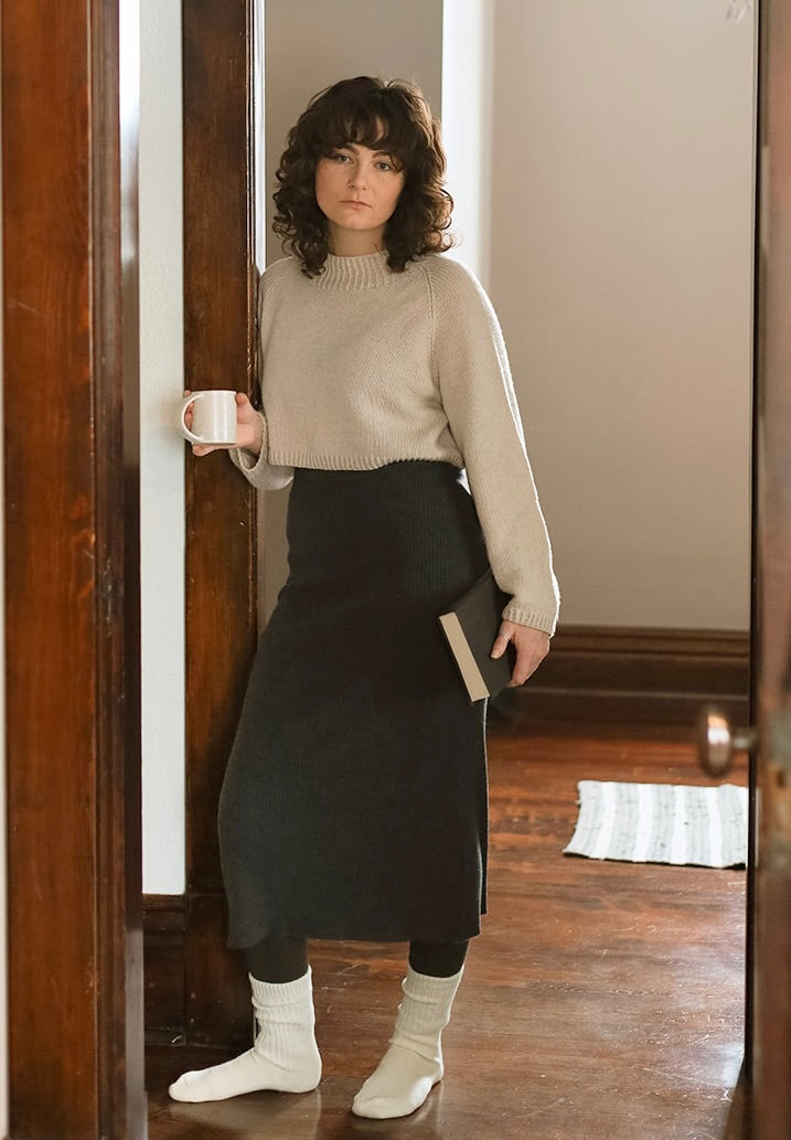 Dinadi - Fall 23 - Merino Cropped Sweater in Almond White & Merino Rib Skirt In Charcoal Grey