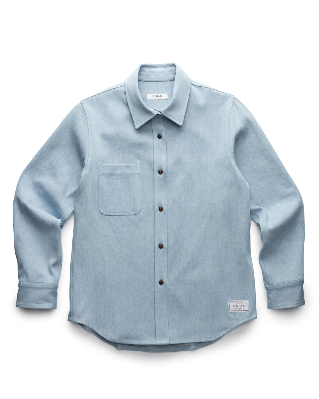 LIGHT BLUE DENIM SHIRT PRODUCT SHOT, LAID FLAT WITH WHITE BACKGROUND