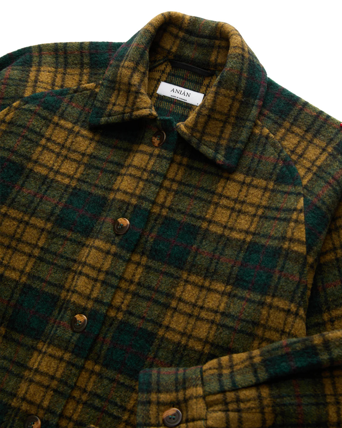 Anian Georgia coat plaid featuring rich green and yellow tones with a stylish button front in Kelowna