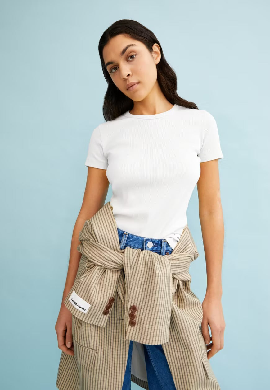 ARMEDANGELS Canada white fitted short sleeve ribbed t-shirtworn by woman with striped jacket tied around waist in Kelowna
