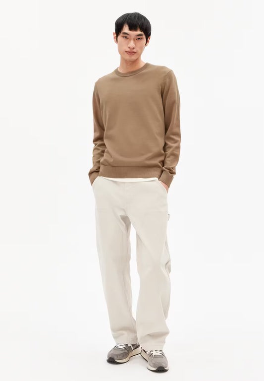 Men's ARMEDANGELS Canada brown crewneck sweater paired with white pants and grey sneakers in Kelowna